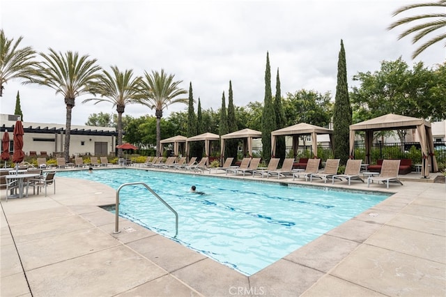 view of pool featuring a gazebo and a patio area