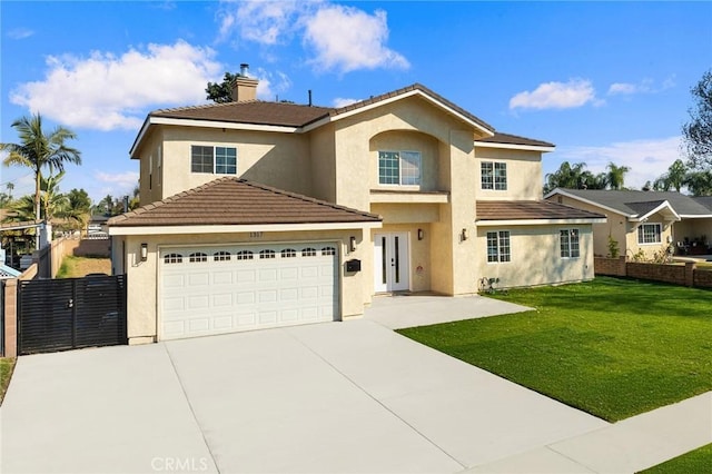 view of front facade with a garage and a front yard