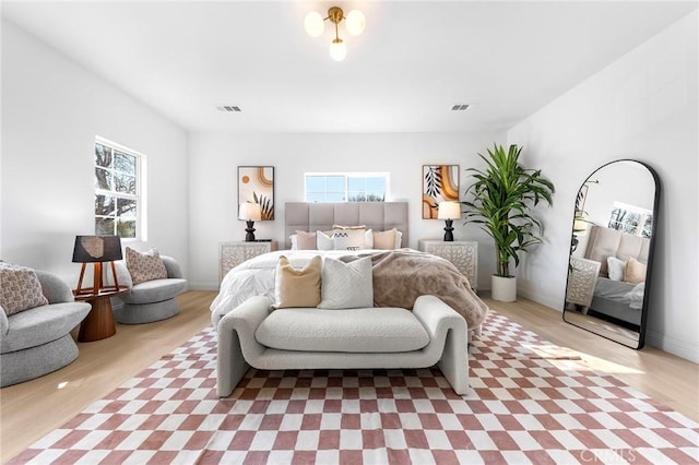 bedroom featuring light hardwood / wood-style flooring