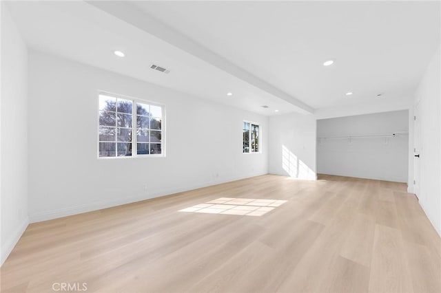 spare room with light wood-type flooring