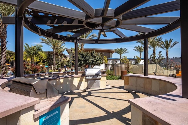 view of patio / terrace featuring fence, grilling area, a pergola, and area for grilling