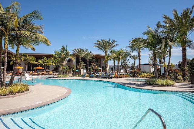 community pool featuring a patio area