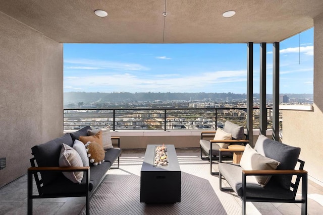 balcony featuring a view of city and an outdoor living space