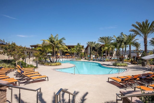 community pool with a patio