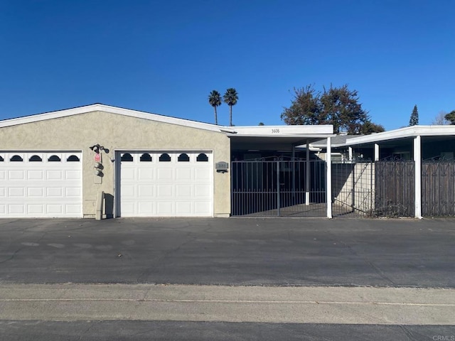 view of front of property with a carport