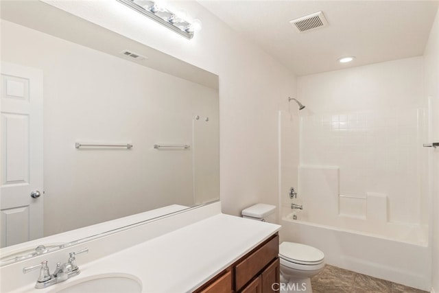 full bathroom with  shower combination, vanity, and toilet