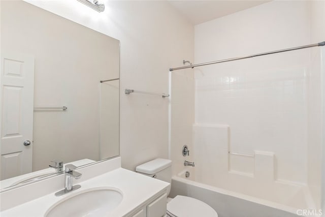 full bathroom with toilet, vanity, and shower / bath combination