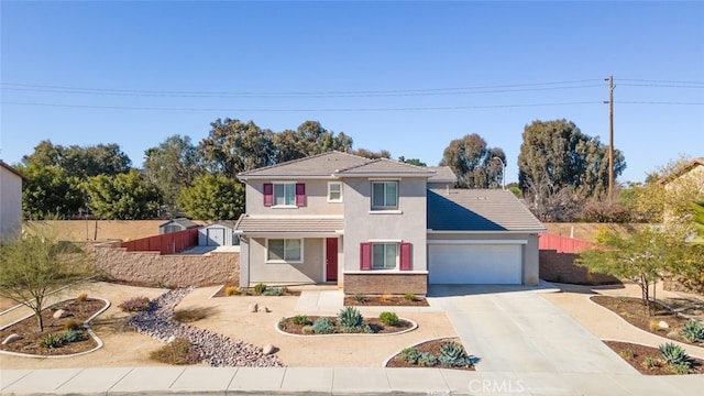 view of front of property with a garage