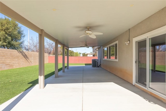 view of patio featuring central AC unit and ceiling fan