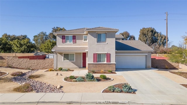 view of front of property with a garage