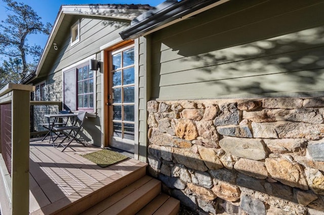 view of home's exterior featuring a deck