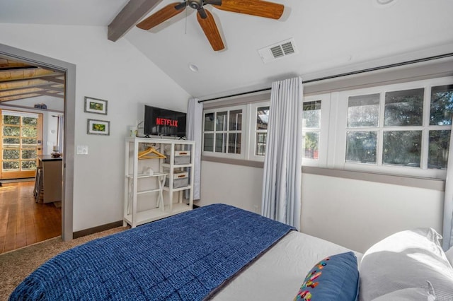 bedroom featuring lofted ceiling with beams and ceiling fan