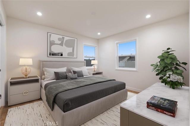 bedroom featuring light wood-type flooring