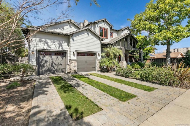 craftsman house featuring a garage