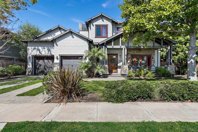 craftsman-style home with a garage