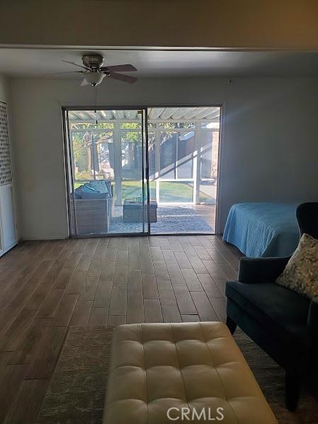 living room featuring ceiling fan