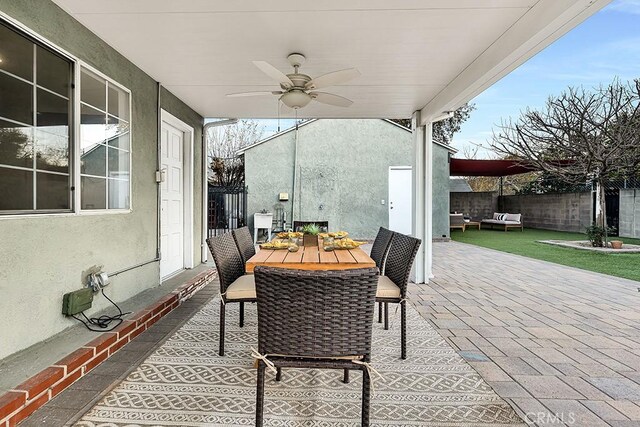 view of patio with ceiling fan