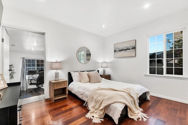 bedroom featuring dark hardwood / wood-style floors