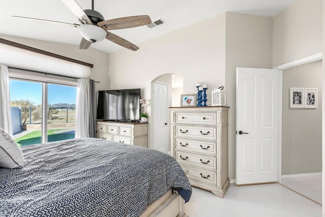 bedroom featuring ceiling fan and lofted ceiling