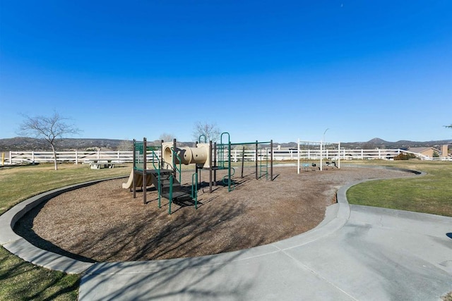 view of play area with a yard