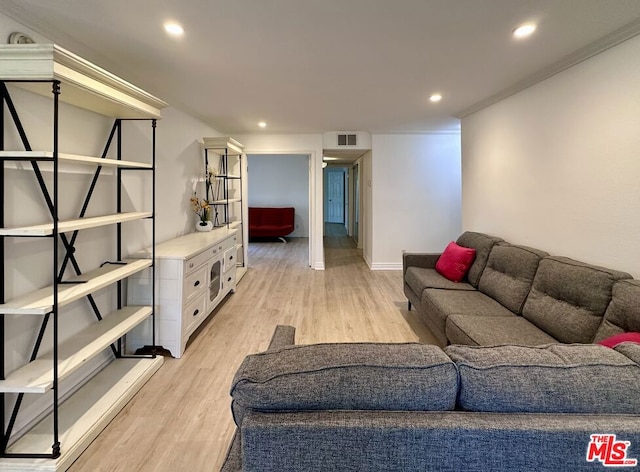 living room with light hardwood / wood-style flooring