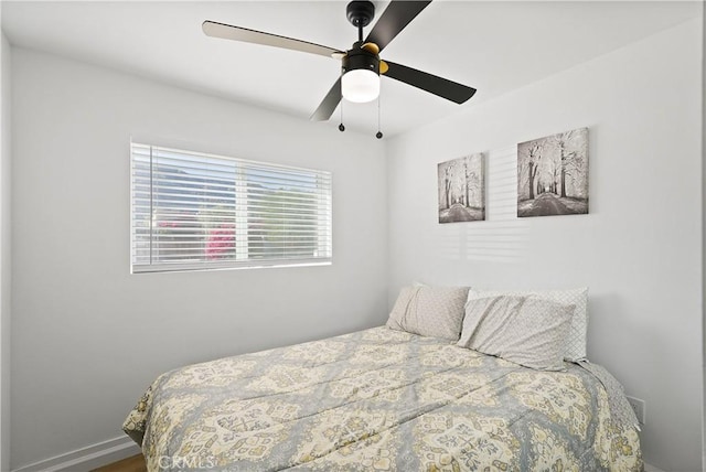 bedroom featuring ceiling fan