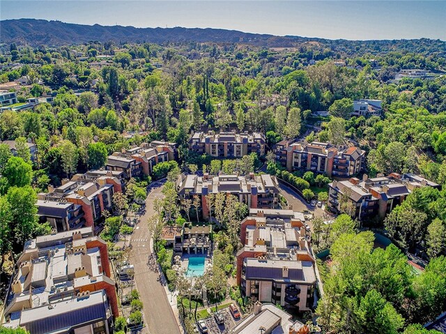 drone / aerial view featuring a mountain view