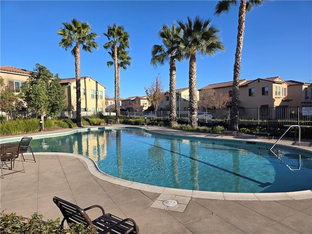 view of pool featuring a patio