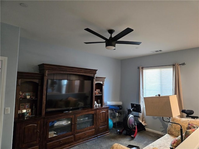 living room with carpet flooring and ceiling fan