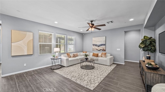 living room with ceiling fan