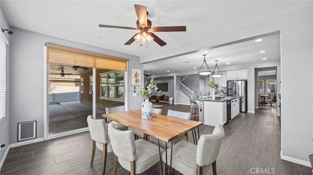 dining area with a healthy amount of sunlight and ceiling fan