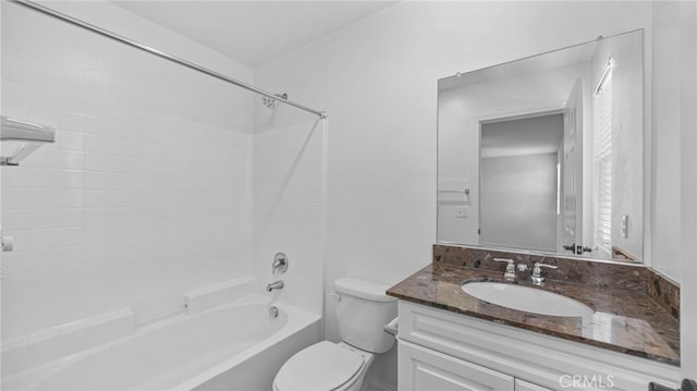 full bathroom with toilet, vanity, and shower / washtub combination