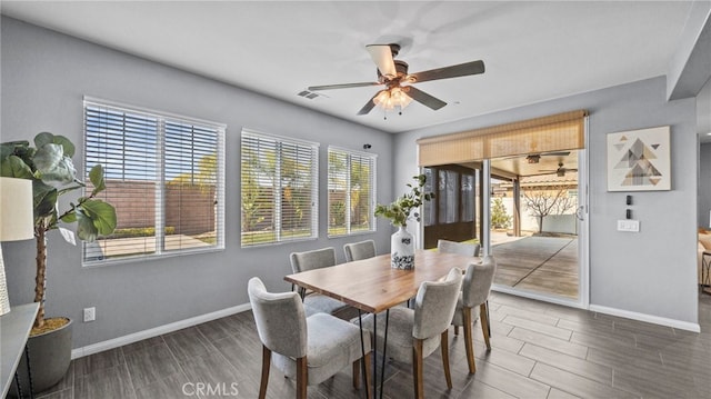 dining area with ceiling fan