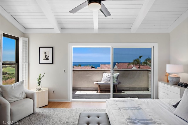 bedroom with ceiling fan, vaulted ceiling with beams, access to outside, and light wood-type flooring