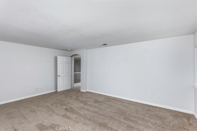 view of carpeted spare room