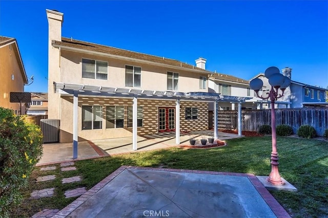 back of property with central AC, a pergola, a patio, and a lawn