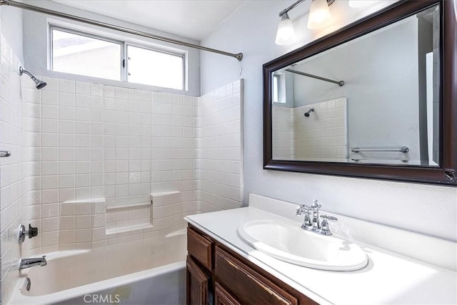 bathroom featuring vanity and washtub / shower combination