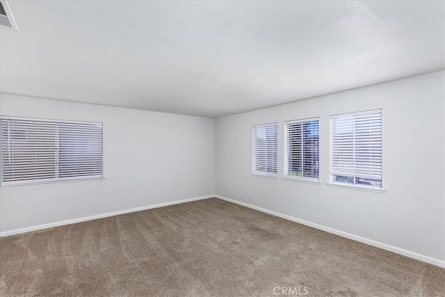 view of carpeted spare room