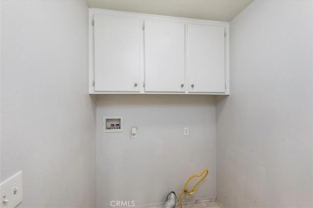 laundry room with cabinets and hookup for a washing machine