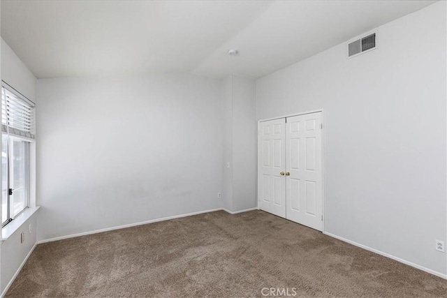 view of carpeted spare room