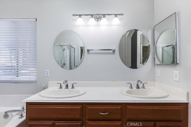 bathroom with plus walk in shower and vanity