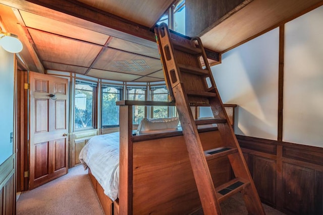 bedroom with light colored carpet