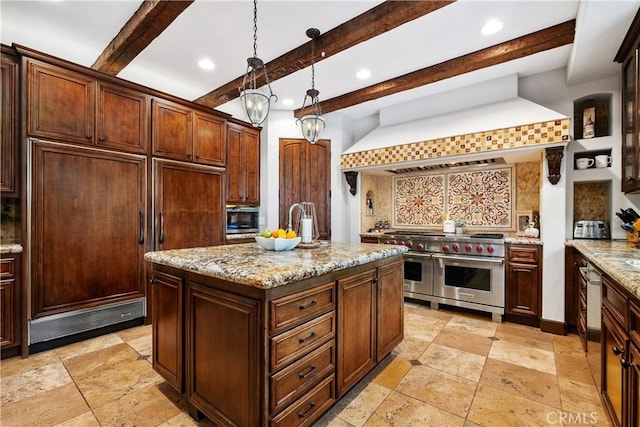 kitchen featuring light stone counters, tasteful backsplash, hanging light fixtures, high quality appliances, and an island with sink