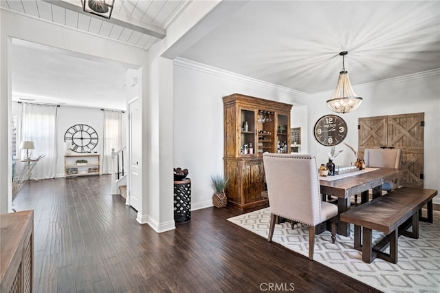 dining area featuring dark hardwood / wood-style flooring, beam ceiling, and an inviting chandelier