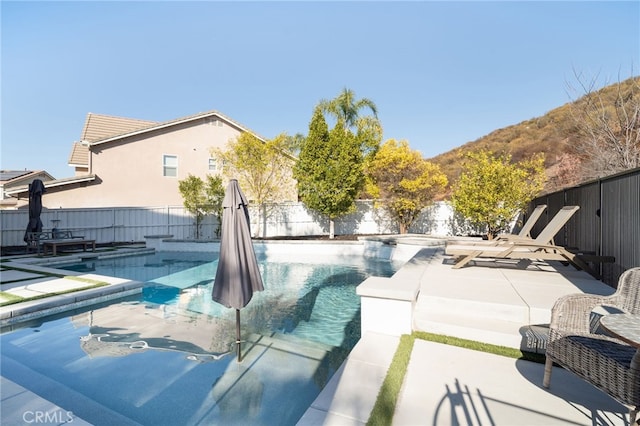 view of pool with a patio area