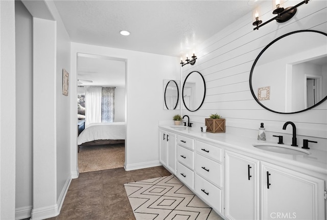 bathroom featuring tile patterned floors and vanity