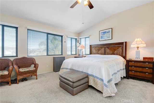 bedroom with light carpet, ceiling fan, and lofted ceiling