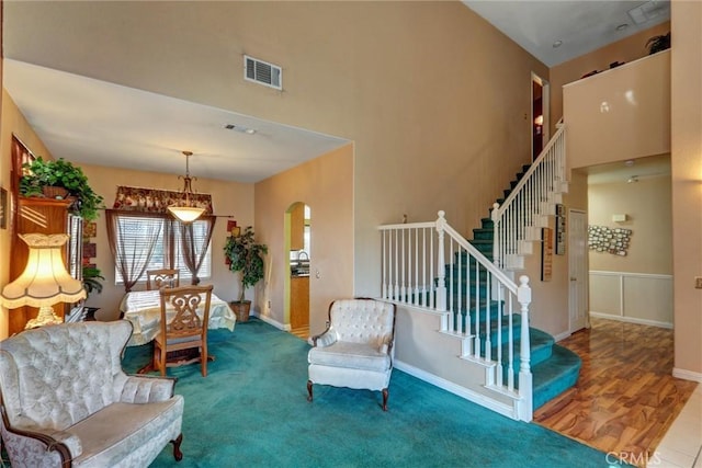 sitting room with hardwood / wood-style flooring