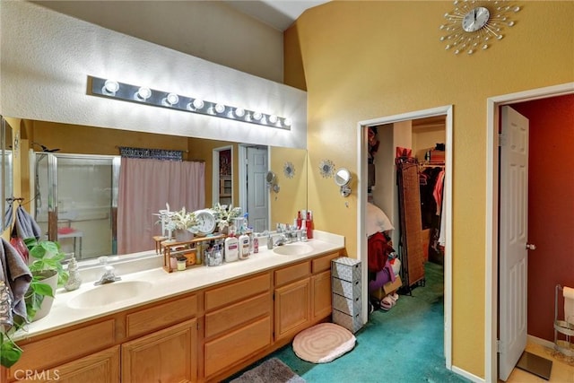 bathroom with vanity and walk in shower