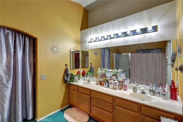 bathroom with vanity and walk in shower